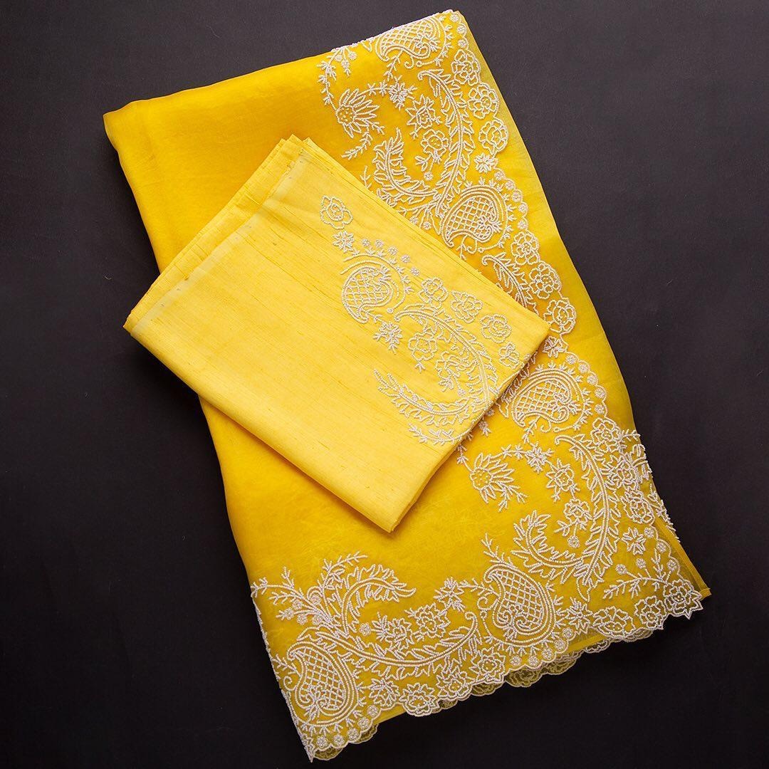 Yellow organza chainstitch work saree