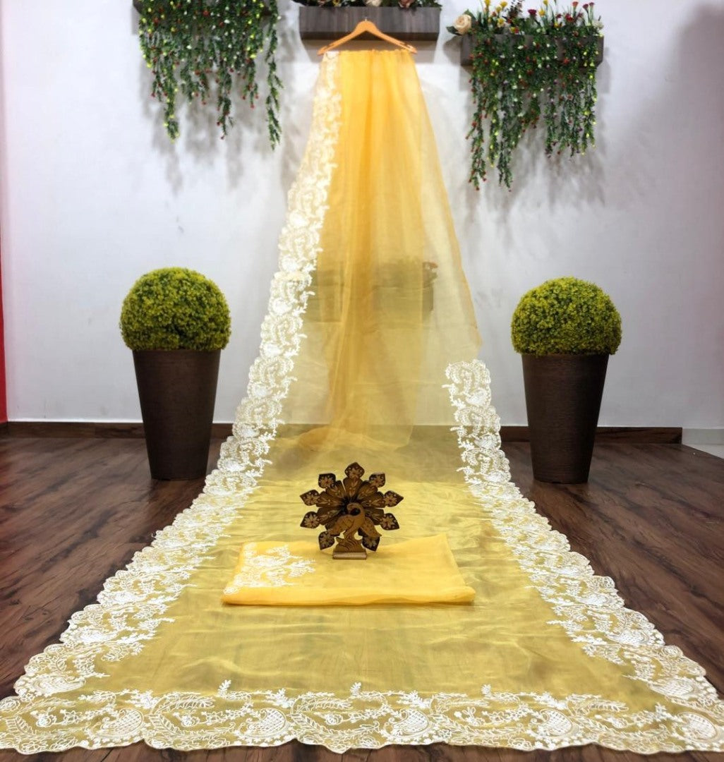 Yellow organza chainstitch work saree