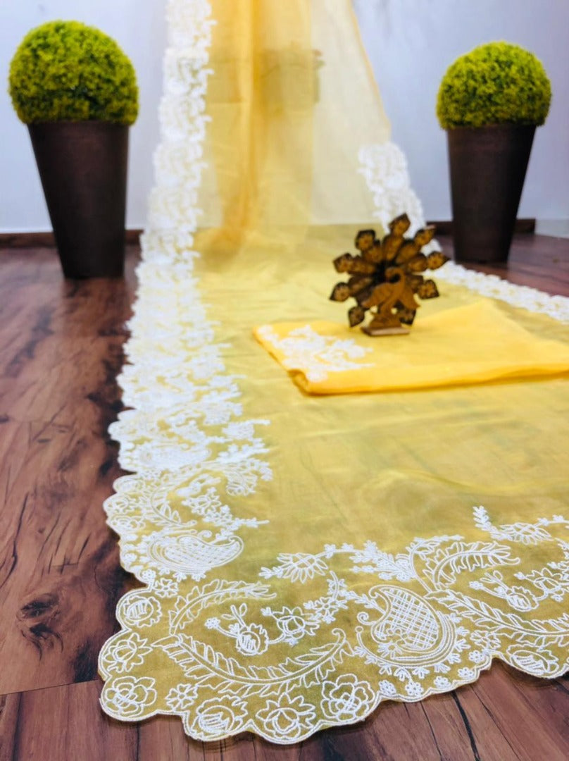 Yellow organza chainstitch work saree