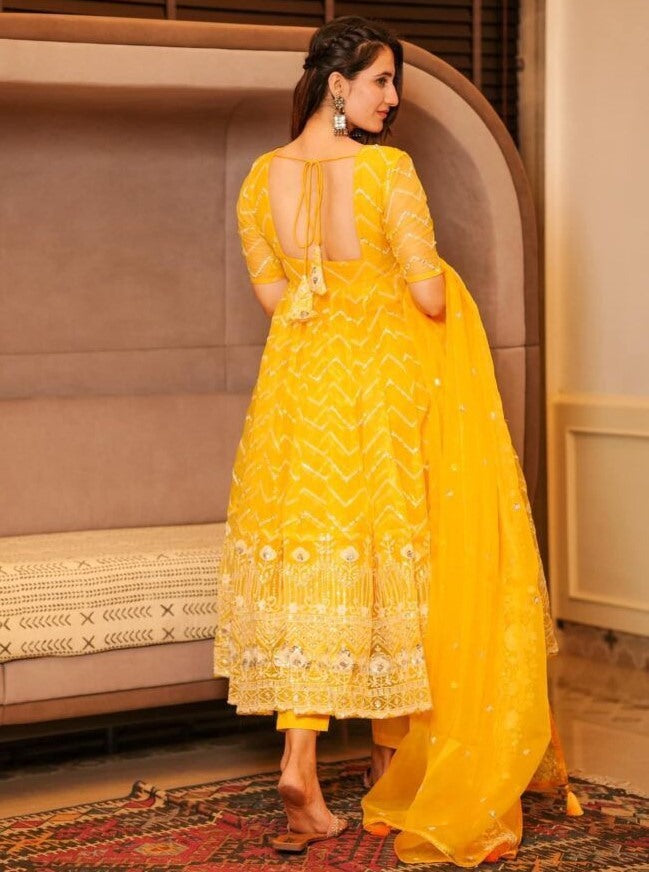Yellow organza emboroidered anarkali suit for ceremony