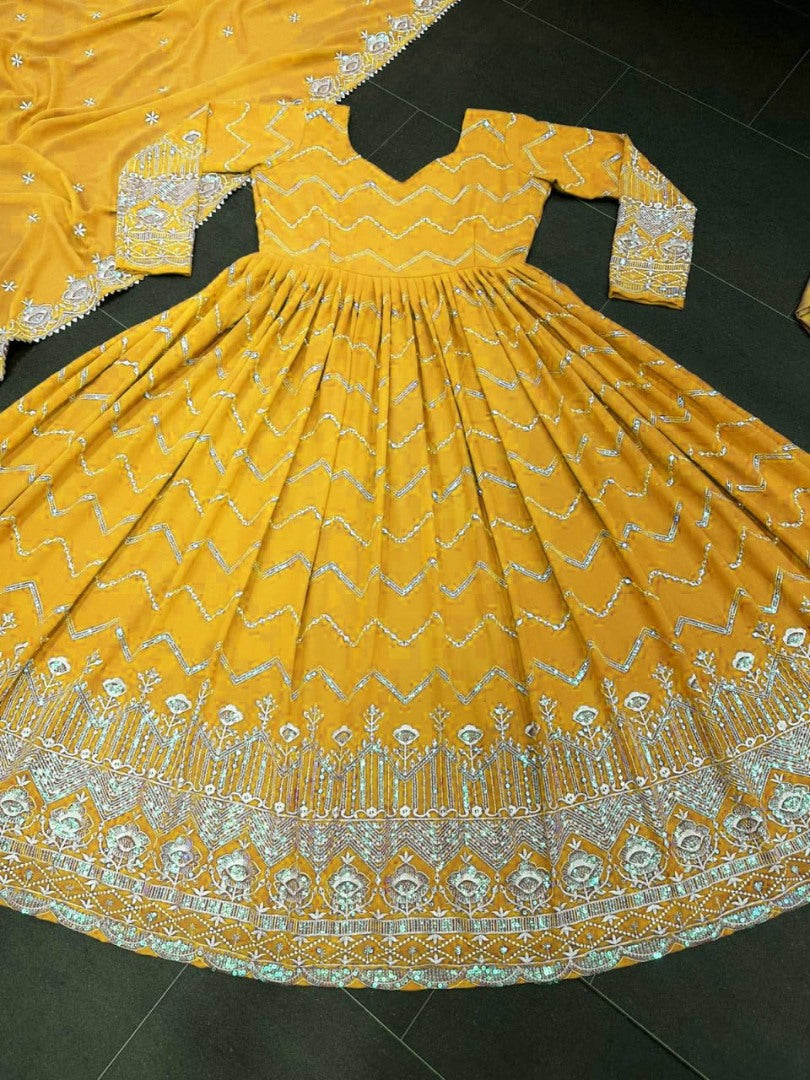 Yellow organza emboroidered anarkali suit for ceremony