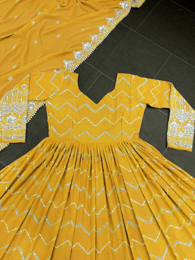 Yellow organza emboroidered anarkali suit for ceremony