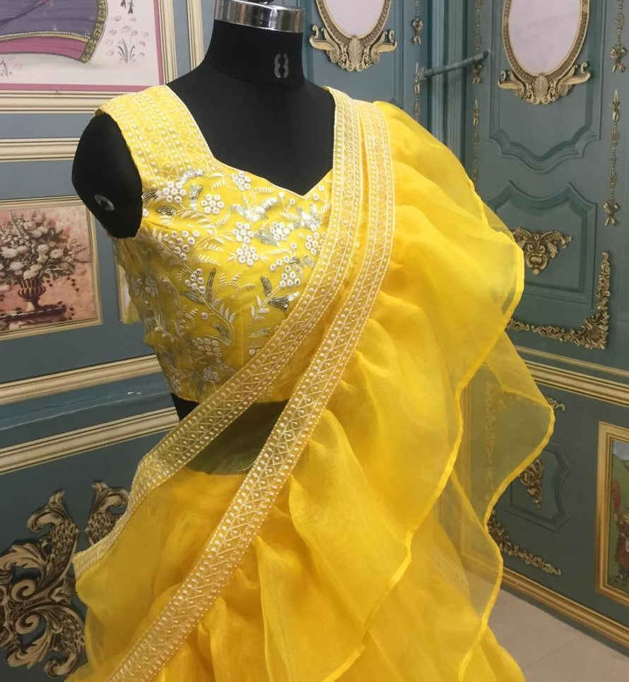 Yellow organza heavy embroidered sequence work lehenga choli