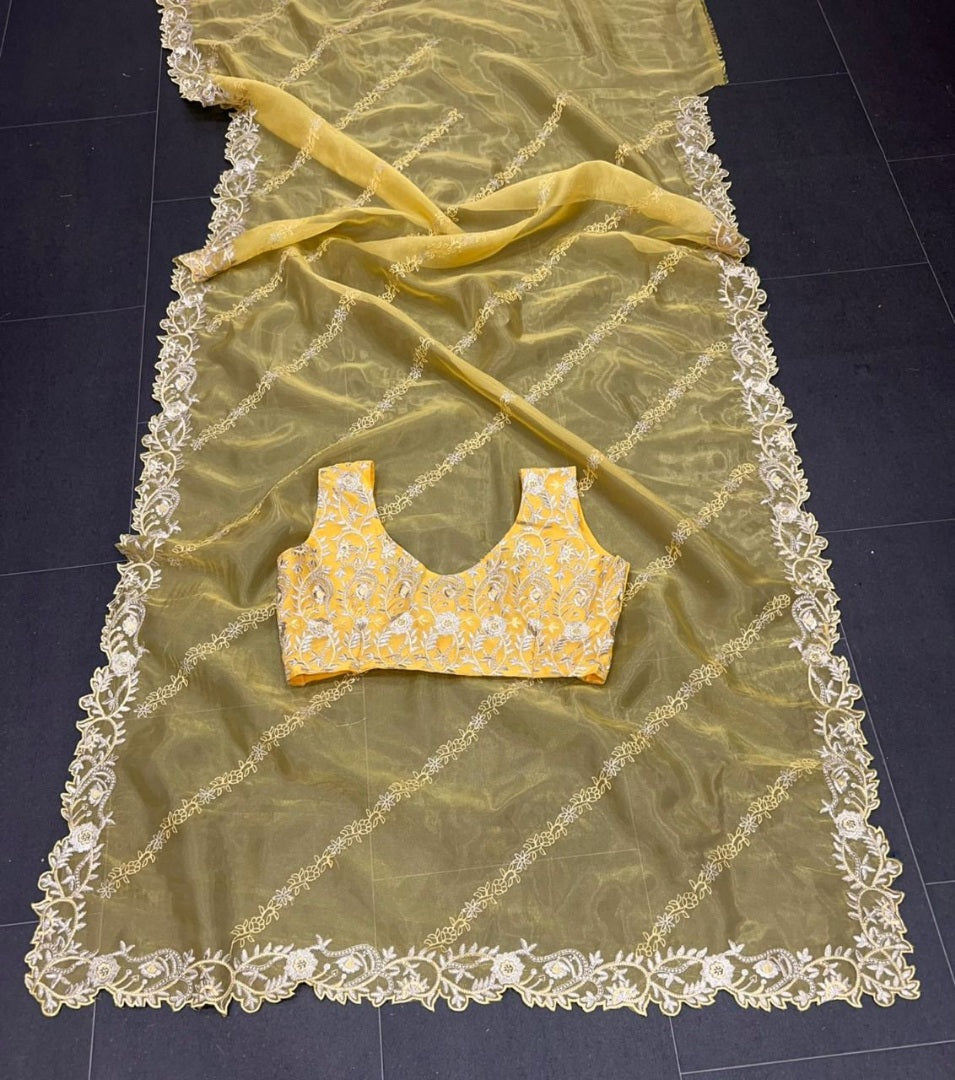 Yellow organza theread embroidered saree