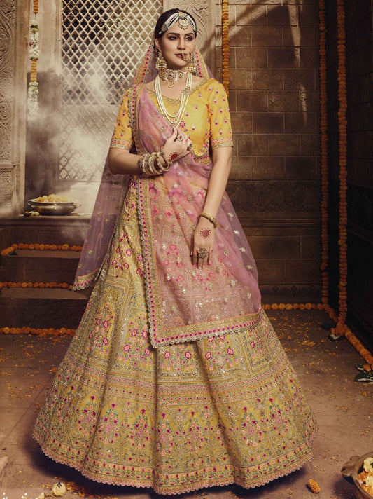 Yellow organza thread stone and sequence work bridal lehenga choli