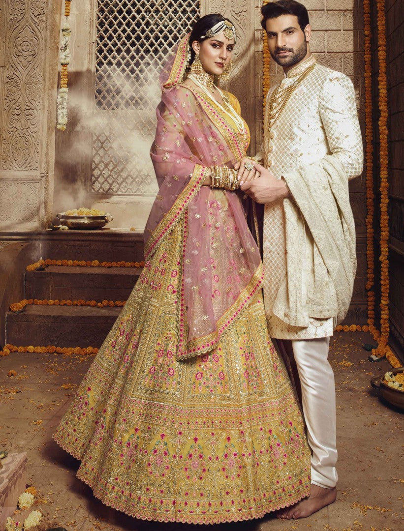 Yellow organza thread stone and sequence work bridal lehenga choli