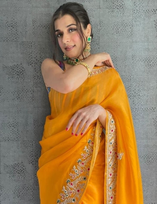 Yellow organza thread work festive saree