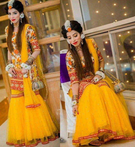 Yellow print and embroidered sharara suit for haldi ceremony