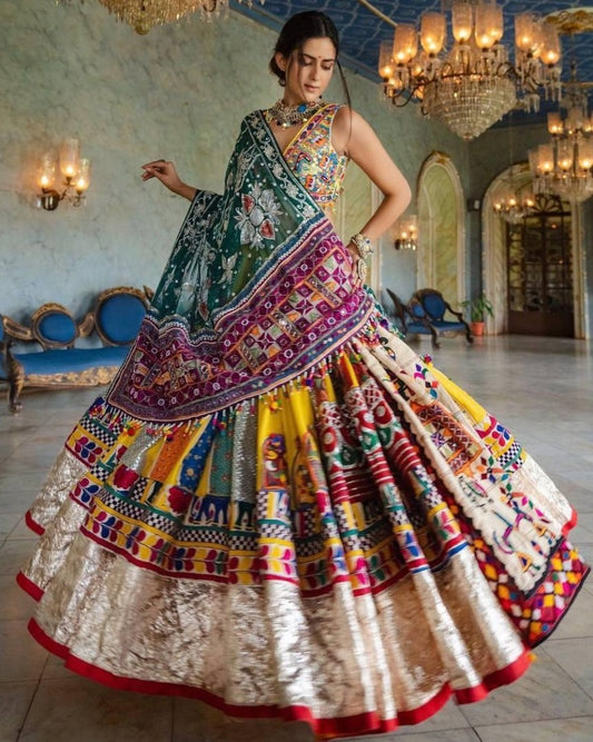 Yellow print and mirror work gujarati garba navratri lehenga chaniya choli