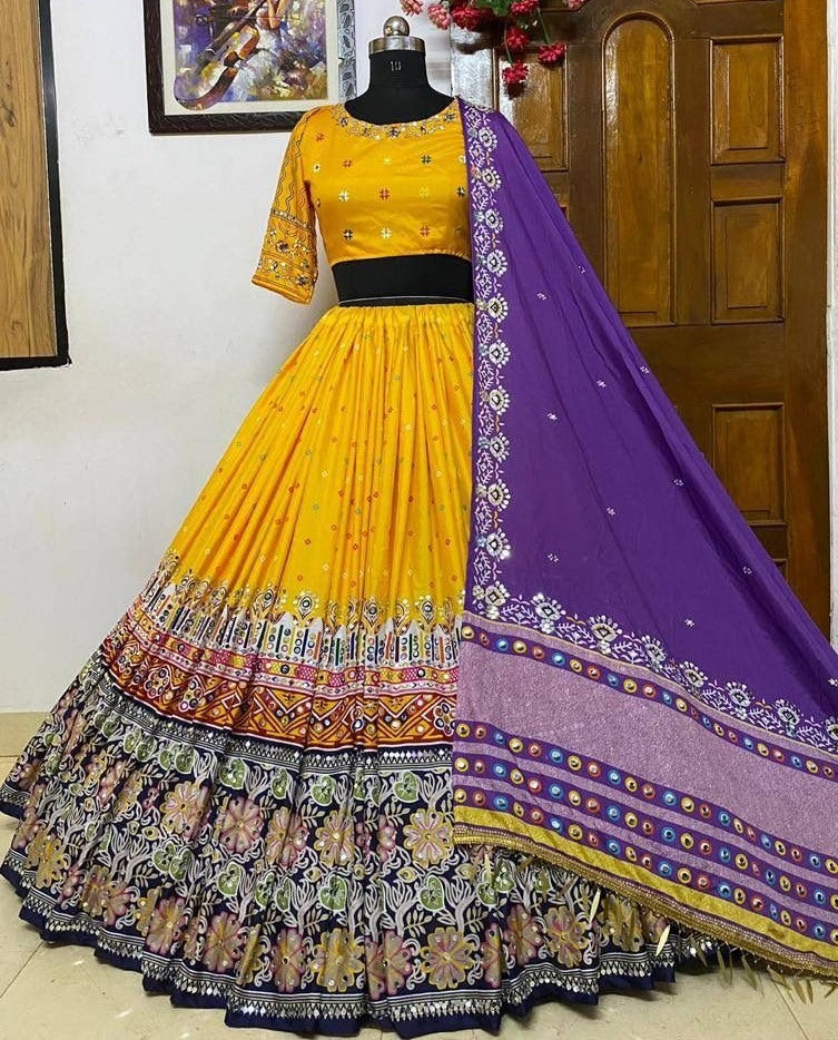 Yellow print and mirror work gujarati garba navratri lehenga chaniya choli