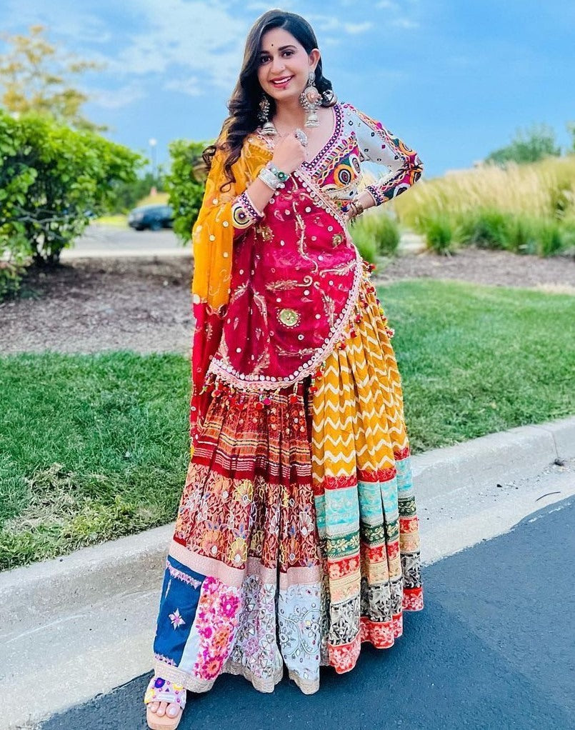 Yellow print mirror work kinjal dave gujarati garba navratri chaniya choli