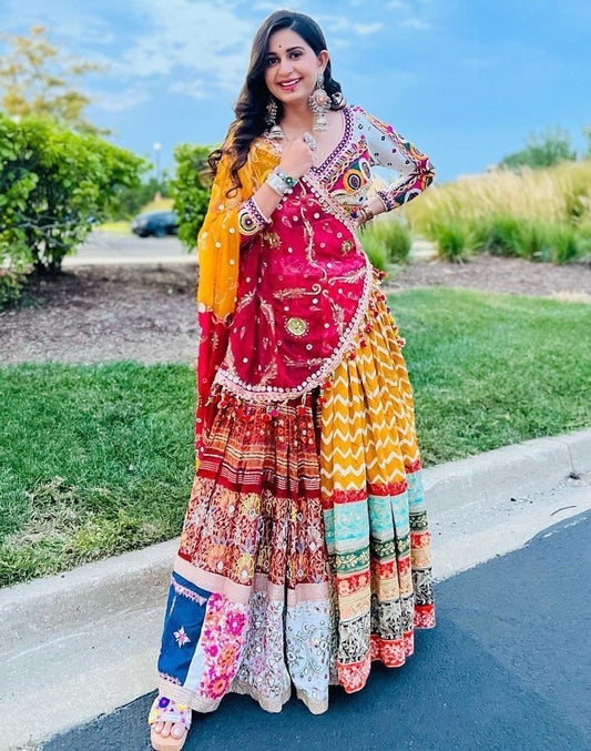 Yellow print mirror work kinjal dave gujarati garba navratri chaniya choli