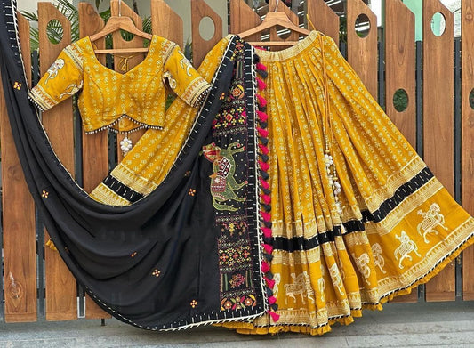 Yellow printed and mirror work gujarati garba navratri ghagra lehenga chaniya choli