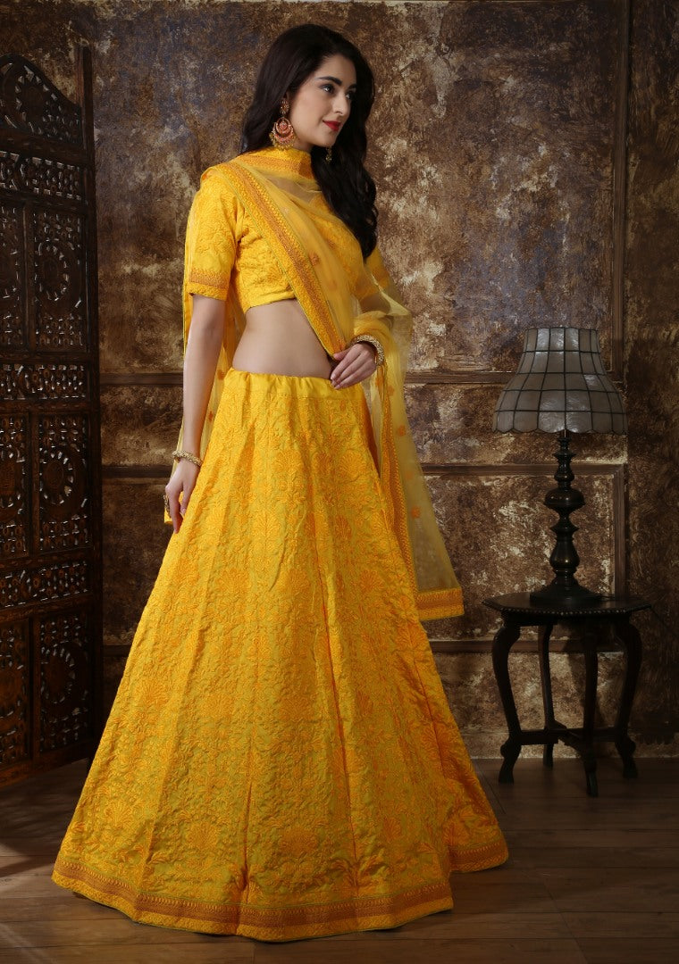 Yellow silk heavy embroidered wedding lehenga choli