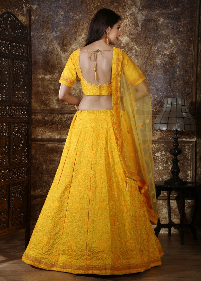 Yellow silk heavy embroidered wedding lehenga choli