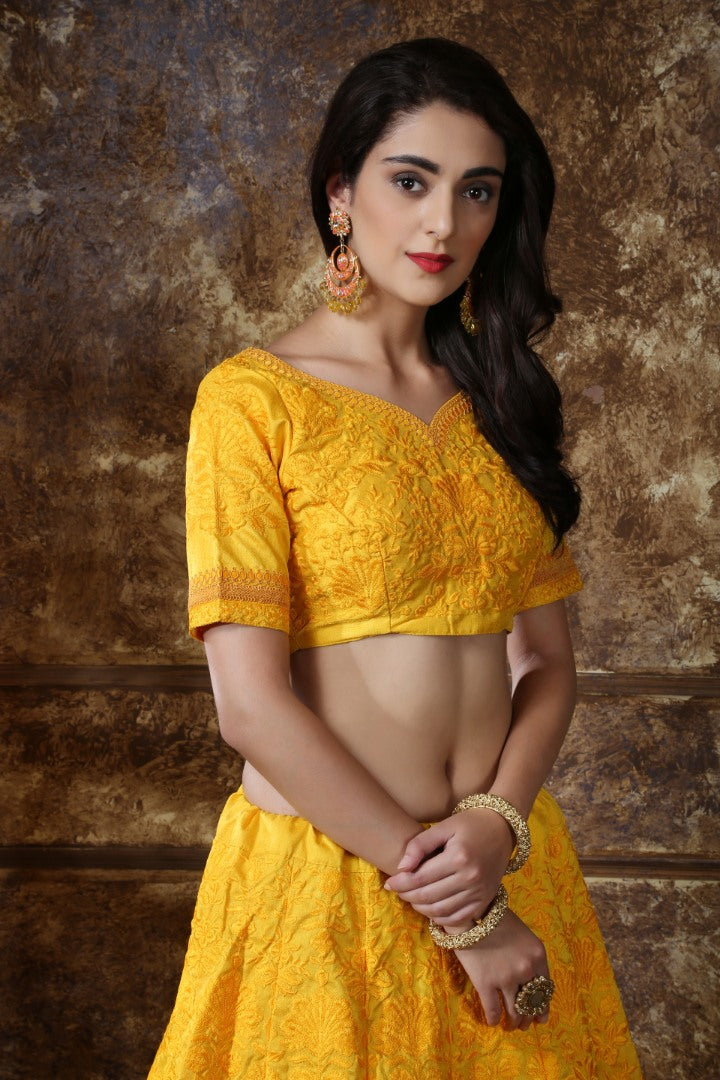Yellow silk heavy embroidered wedding lehenga choli