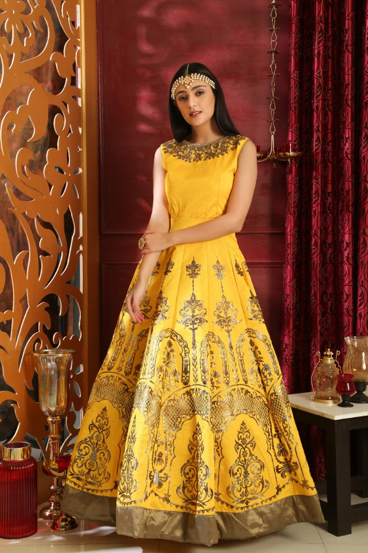 Yellow silk metalic foil and zardosi handworked neck heavy partywear gown