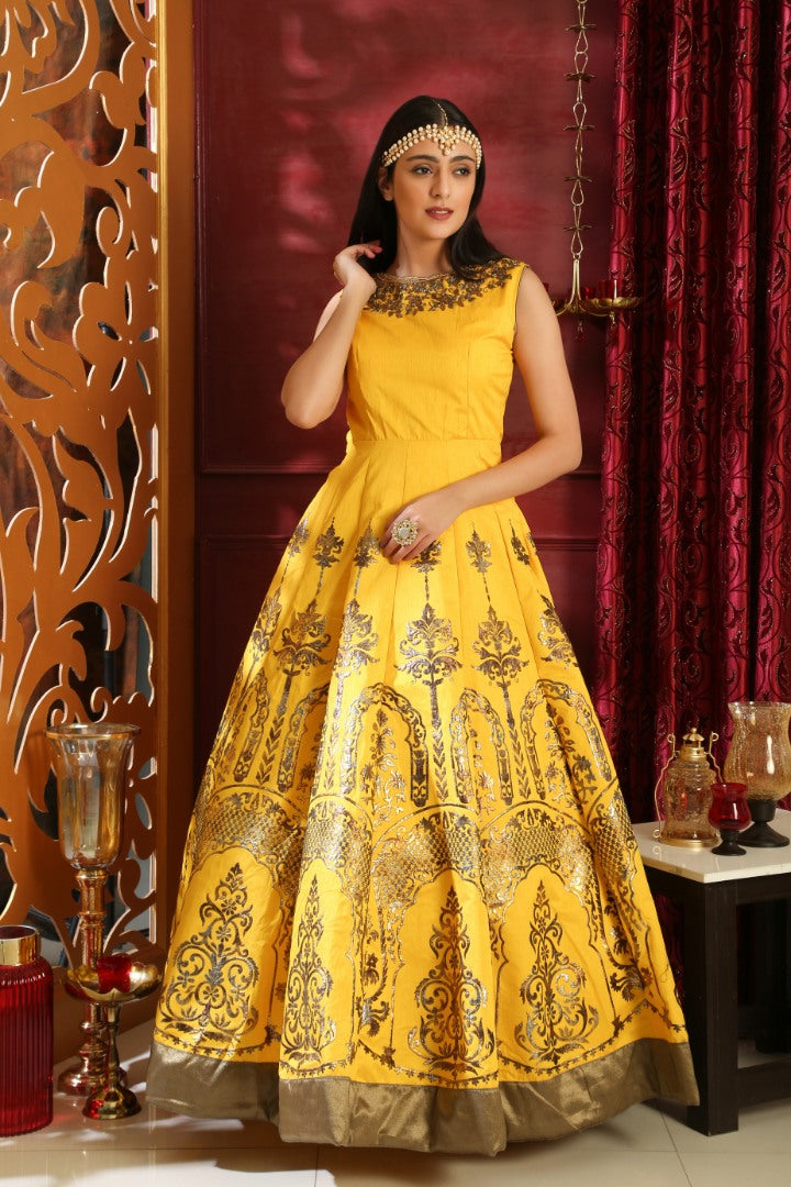 Yellow silk metalic foil and zardosi handworked neck heavy partywear gown