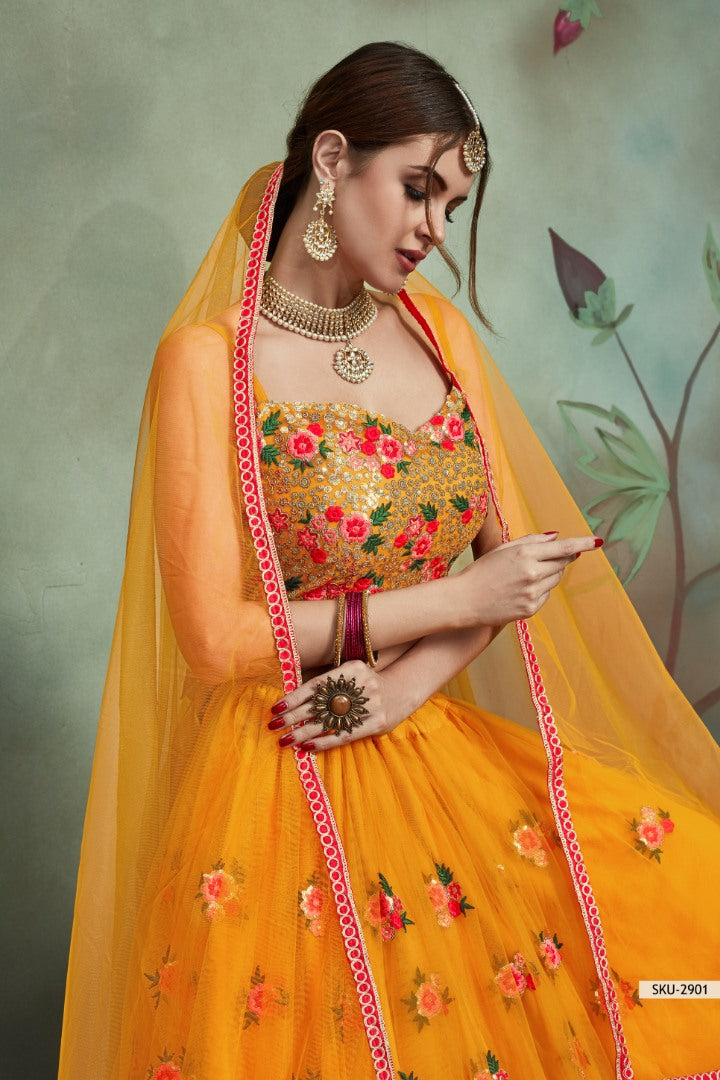 Yellow soft net sequence and theadworked lehenga choli for haldi