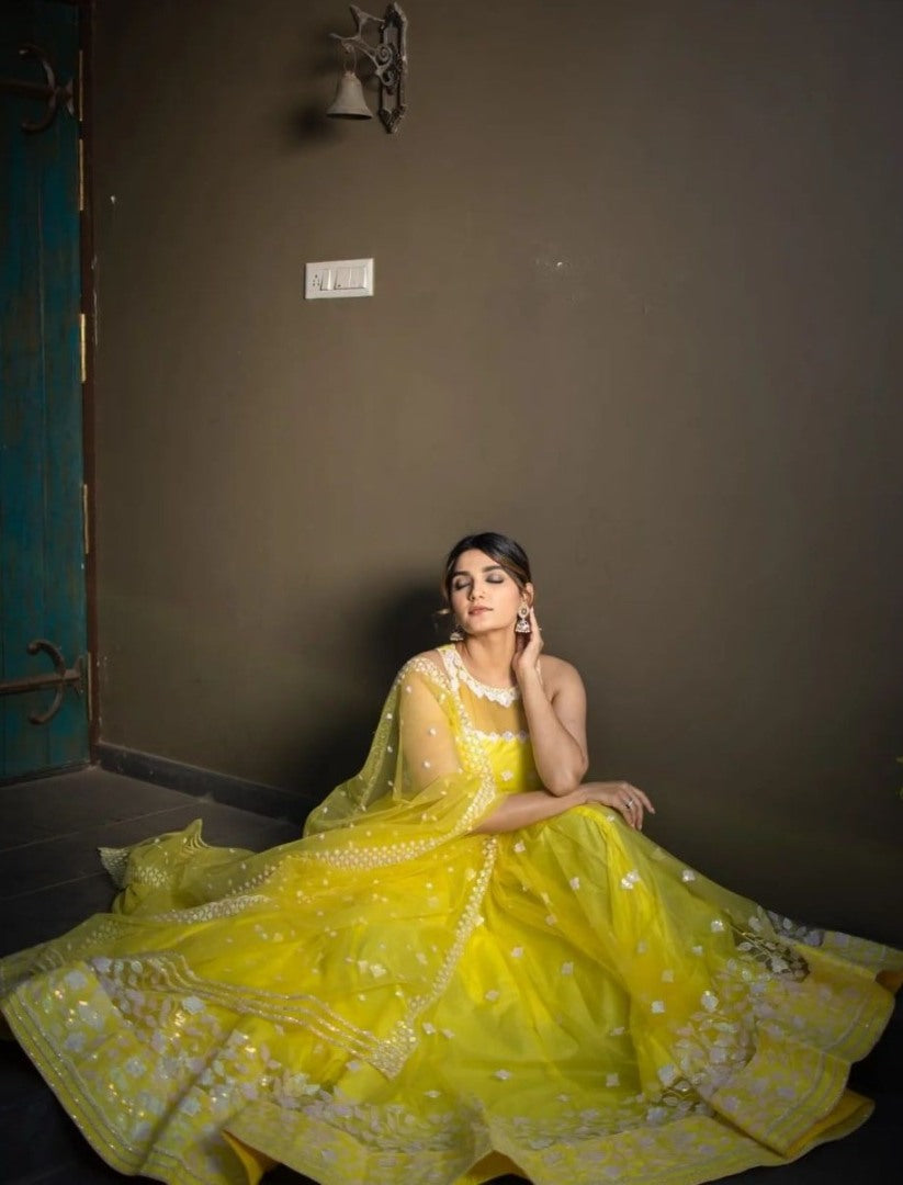 Yellow soft net sequence and thread embroidery work lehenga choli for ceremony