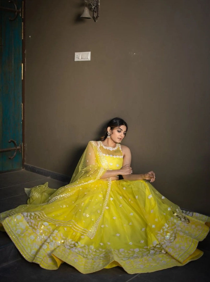 Yellow soft net sequence and thread embroidery work lehenga choli for ceremony