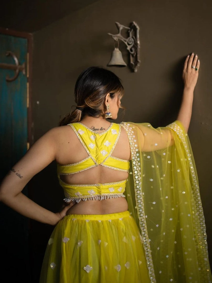 Yellow soft net sequence and thread embroidery work lehenga choli for ceremony