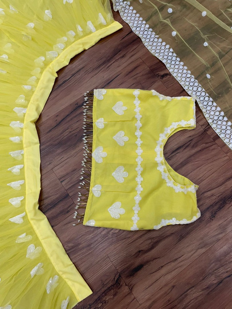 Yellow soft net sequence and thread embroidery work lehenga choli for ceremony
