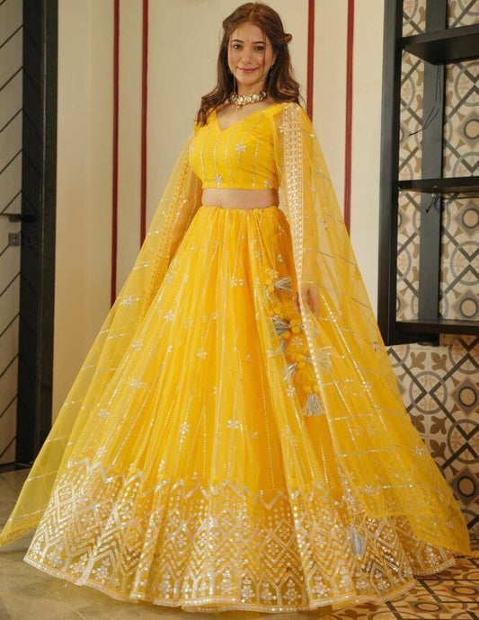 Yellow soft net sequence embroidery work haldi ceremony lehenga choli