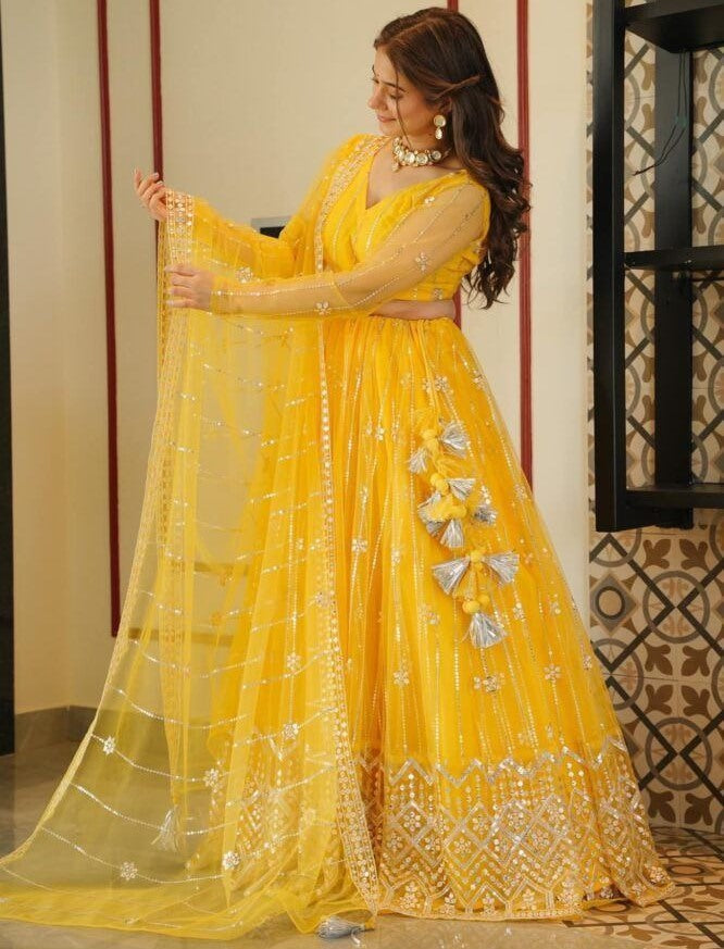 Yellow soft net sequence embroidery work haldi ceremony lehenga choli