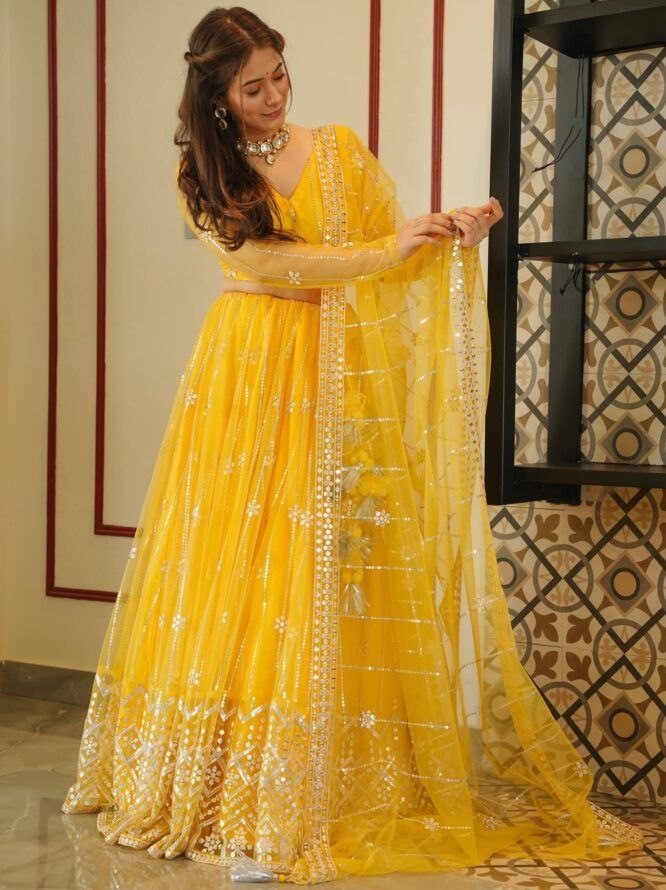 Yellow soft net sequence embroidery work haldi ceremony lehenga choli