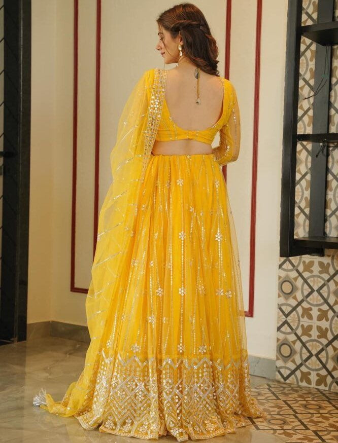 Yellow soft net sequence embroidery work haldi ceremony lehenga choli