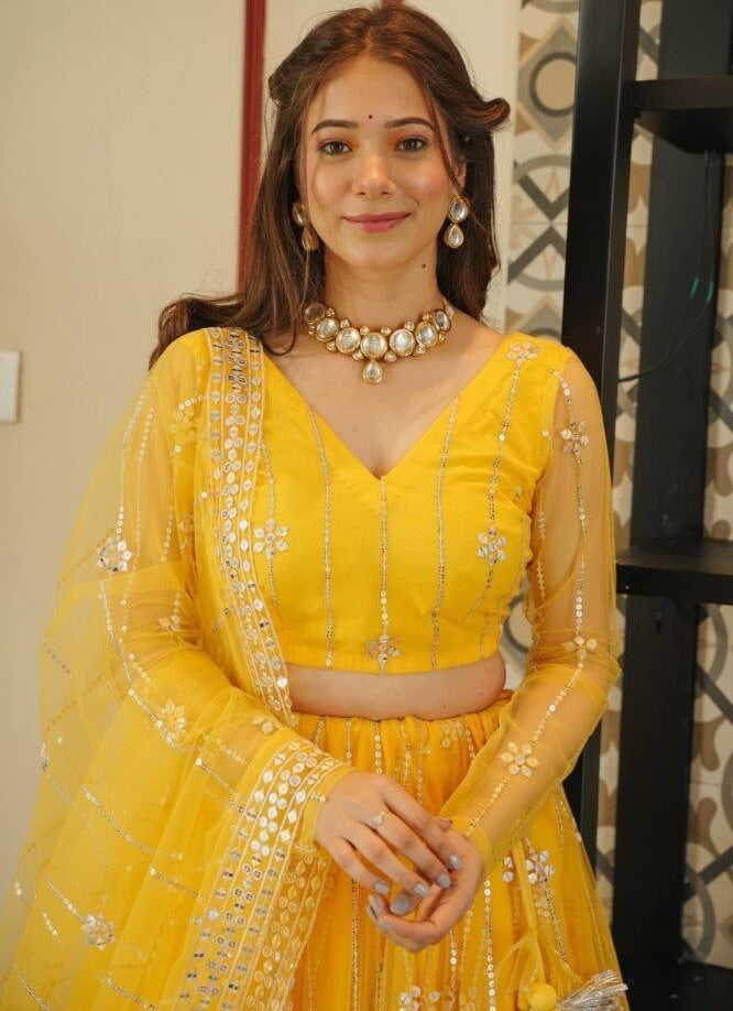 Yellow soft net sequence embroidery work haldi ceremony lehenga choli