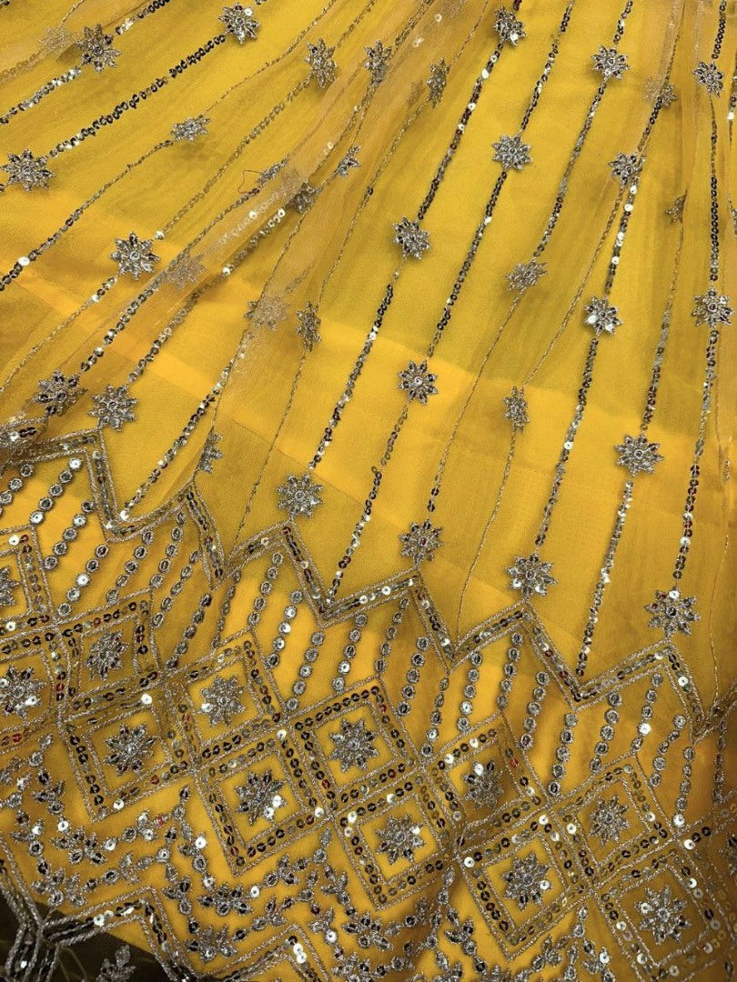 Yellow soft net sequence embroidery work haldi ceremony lehenga choli