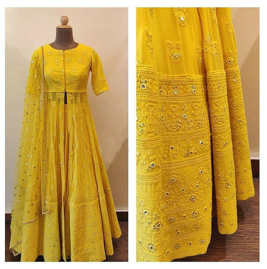 Yellow tapeta lehenga with long choli