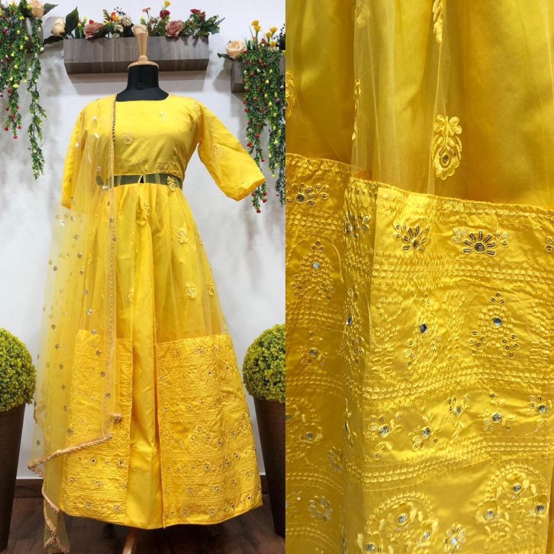 Yellow tapeta lehenga with long choli