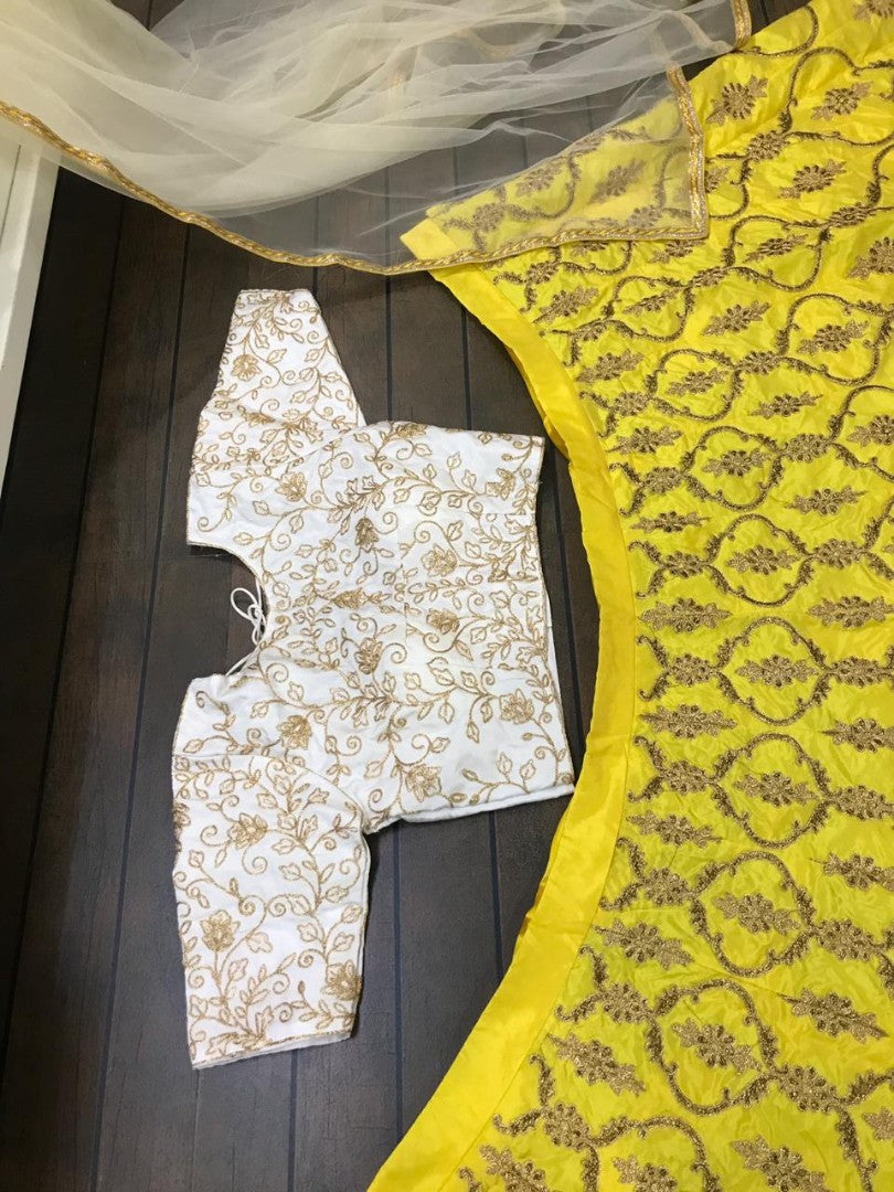 yellow tapeta silk embroidered wedding lehenga choli