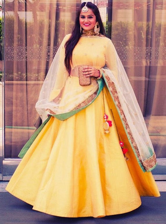 Yellow tapeta silk gorgeous ceremonial lehenga