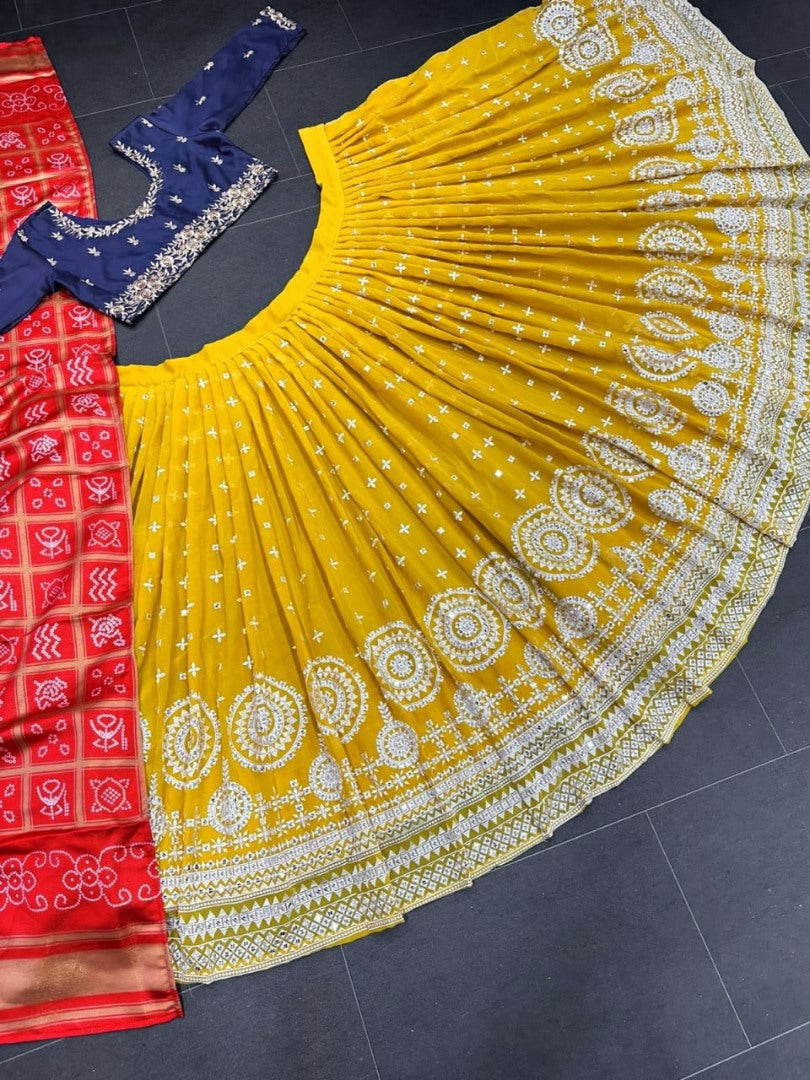 Yellow tapeta silk heavy embroidery work haldi ceremony lehenga choli