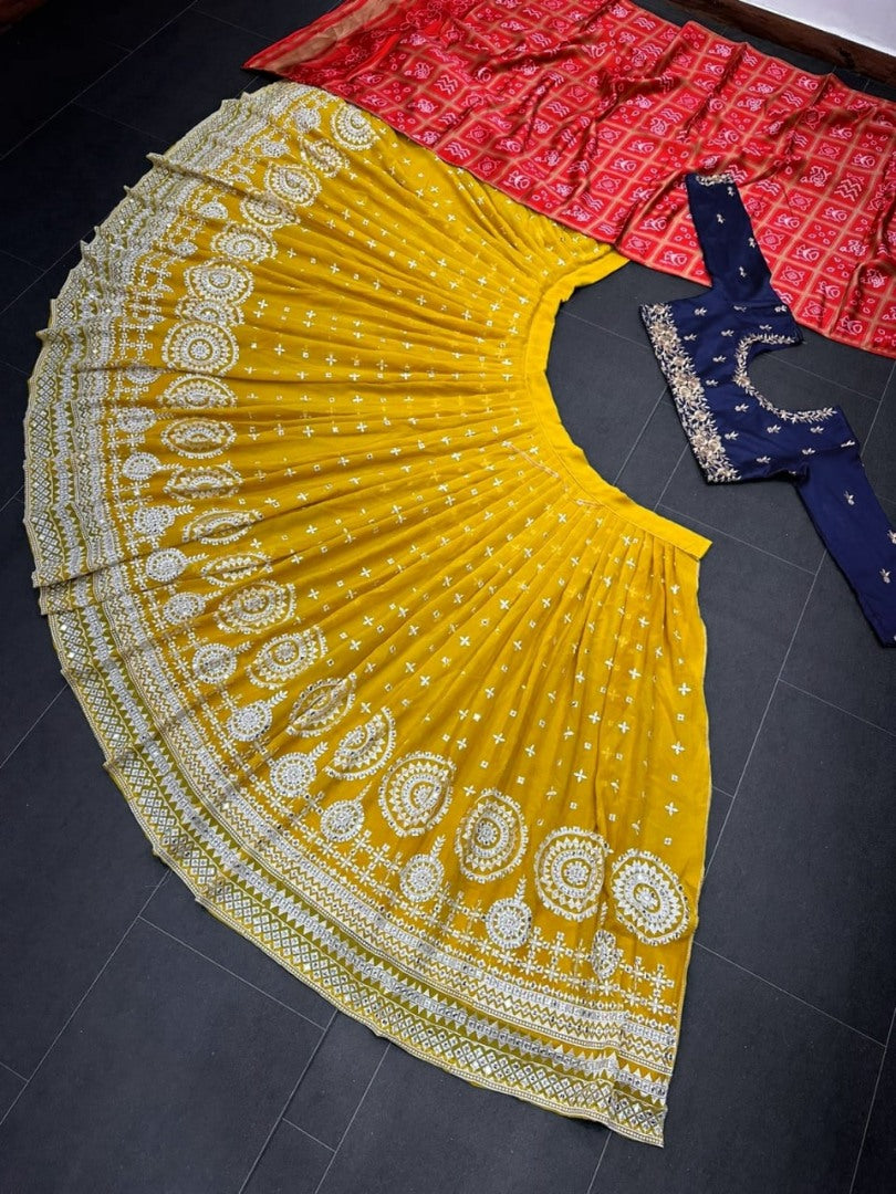 Yellow tapeta silk heavy embroidery work haldi ceremony lehenga choli