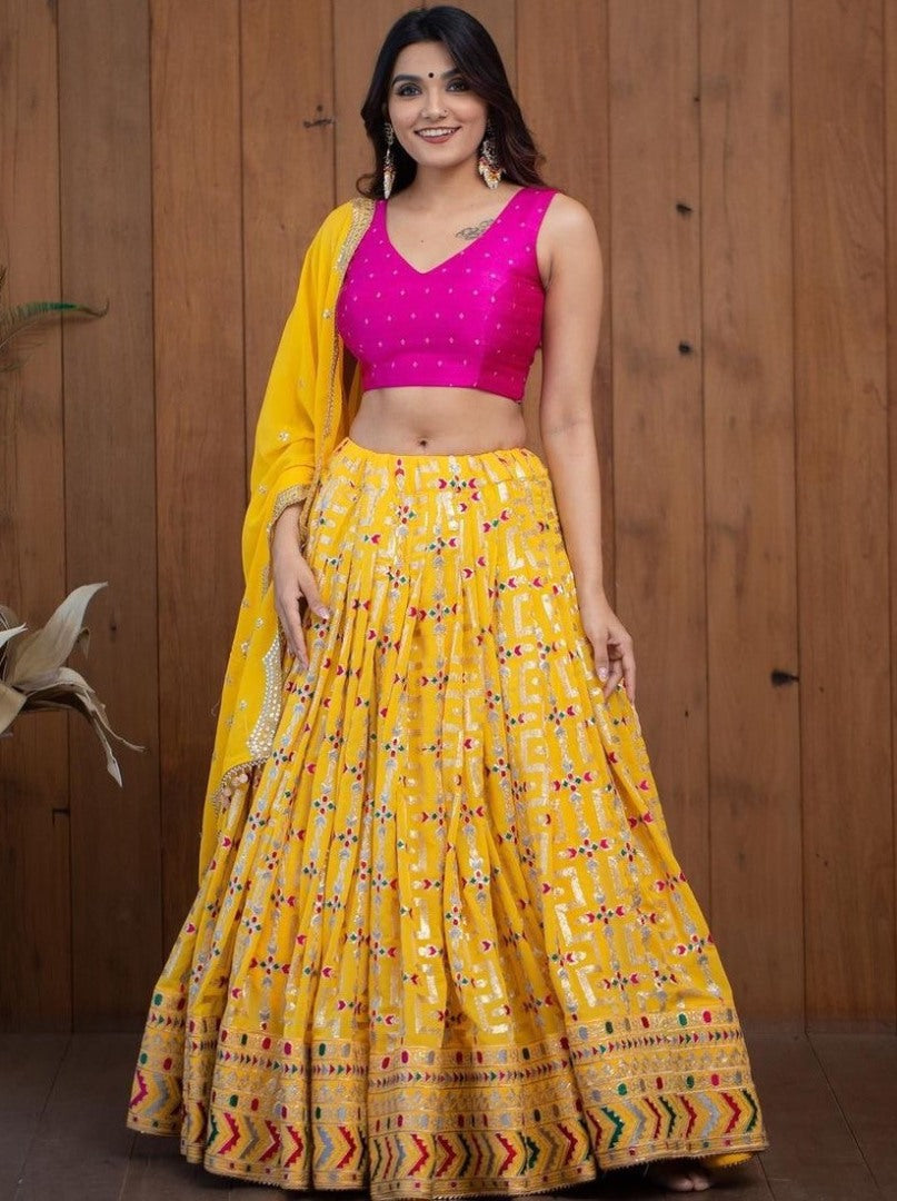 Yellow tapeta silk heavy embroidery work lehenga choli for haldi ceremony