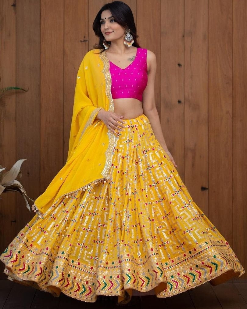 Yellow tapeta silk heavy embroidery work lehenga choli for haldi ceremony