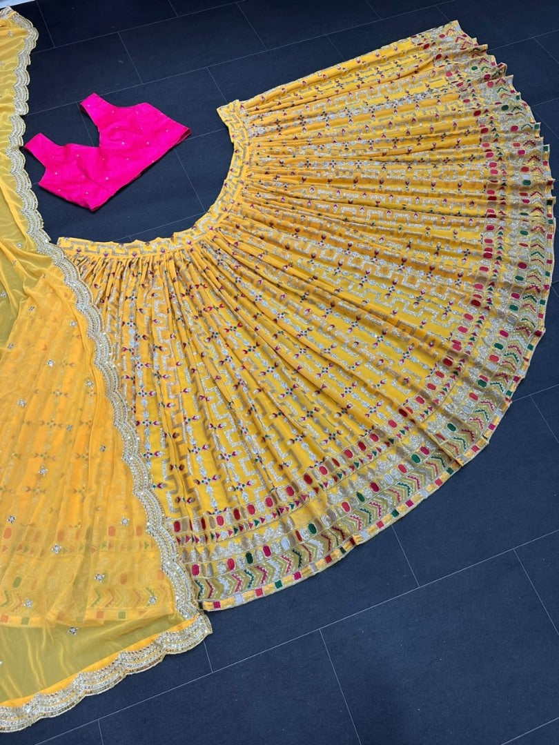 Yellow tapeta silk heavy embroidery work lehenga choli for haldi ceremony