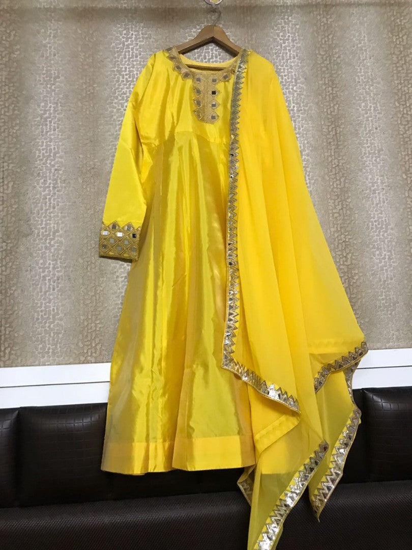 yellow tapeta silk mirrow worked anarkali suit
