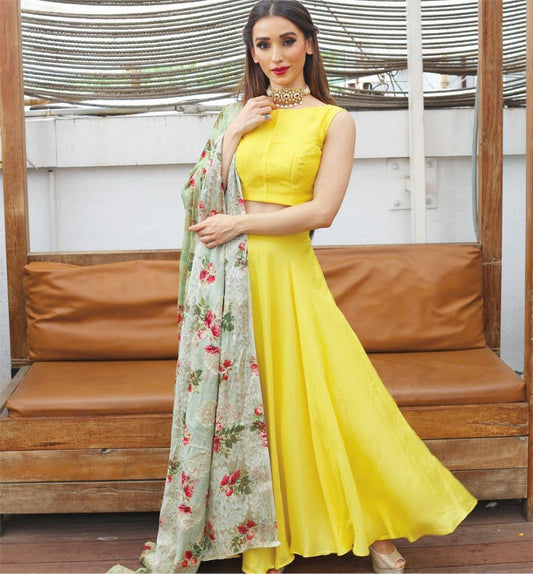 yellow tapeta silk plain party festival wear lehenga with printed dupatta