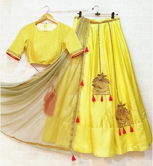 Yellow tapeta silk stylist partywear lehenga