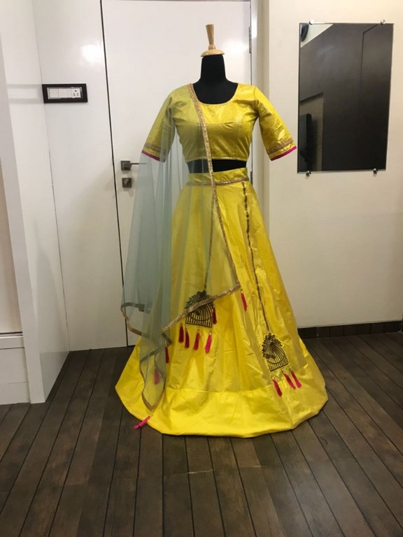 Yellow tapeta silk stylist partywear lehenga
