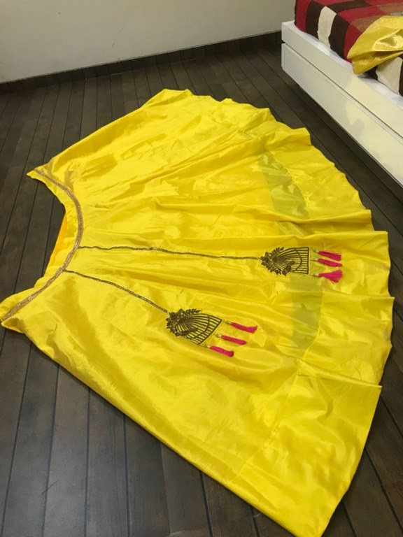 Yellow tapeta silk stylist partywear lehenga