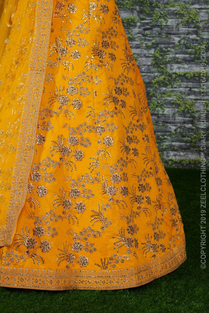 Yellow thai silk heavy zari and sequence worked designer bridal lehenga choli