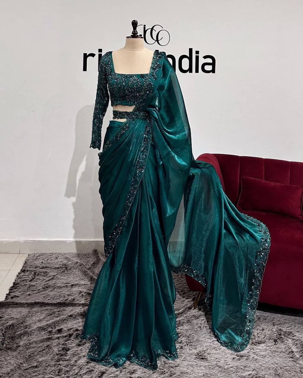 Green jimmy choo designer party wear saree