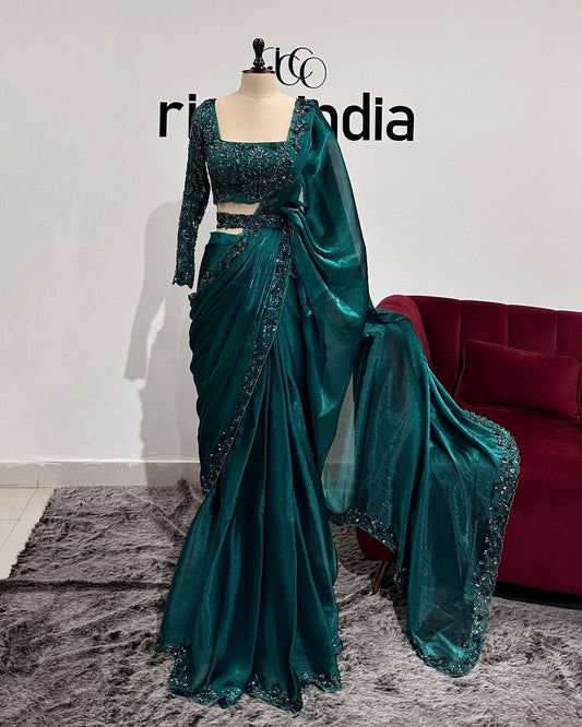 Green jimmy choo designer party wear saree